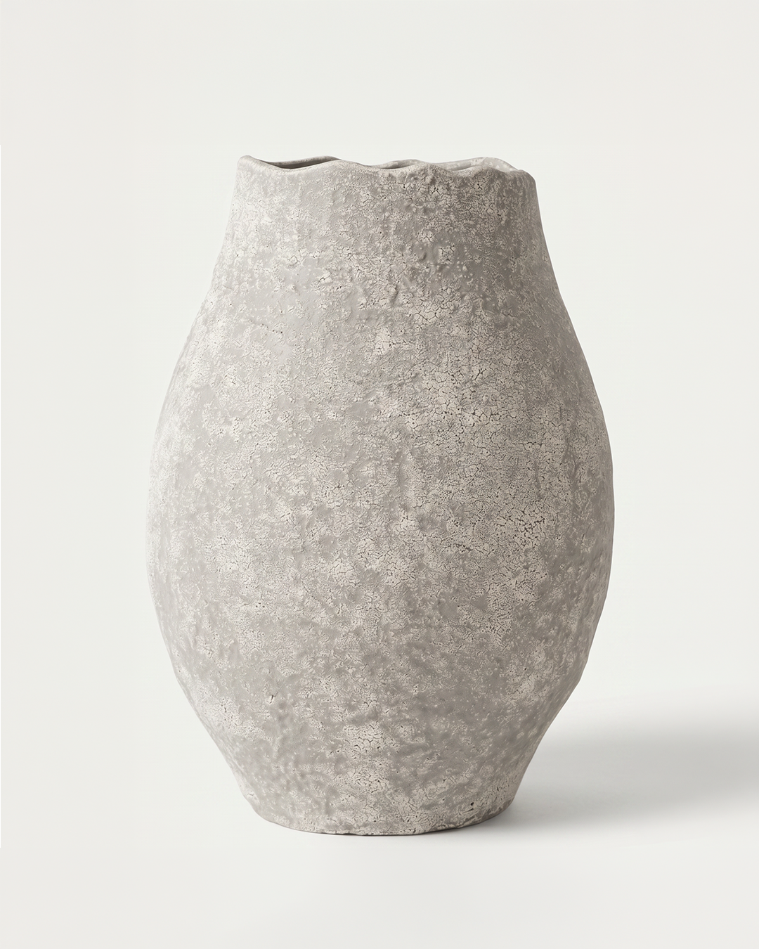 Textured gray vase on a white background