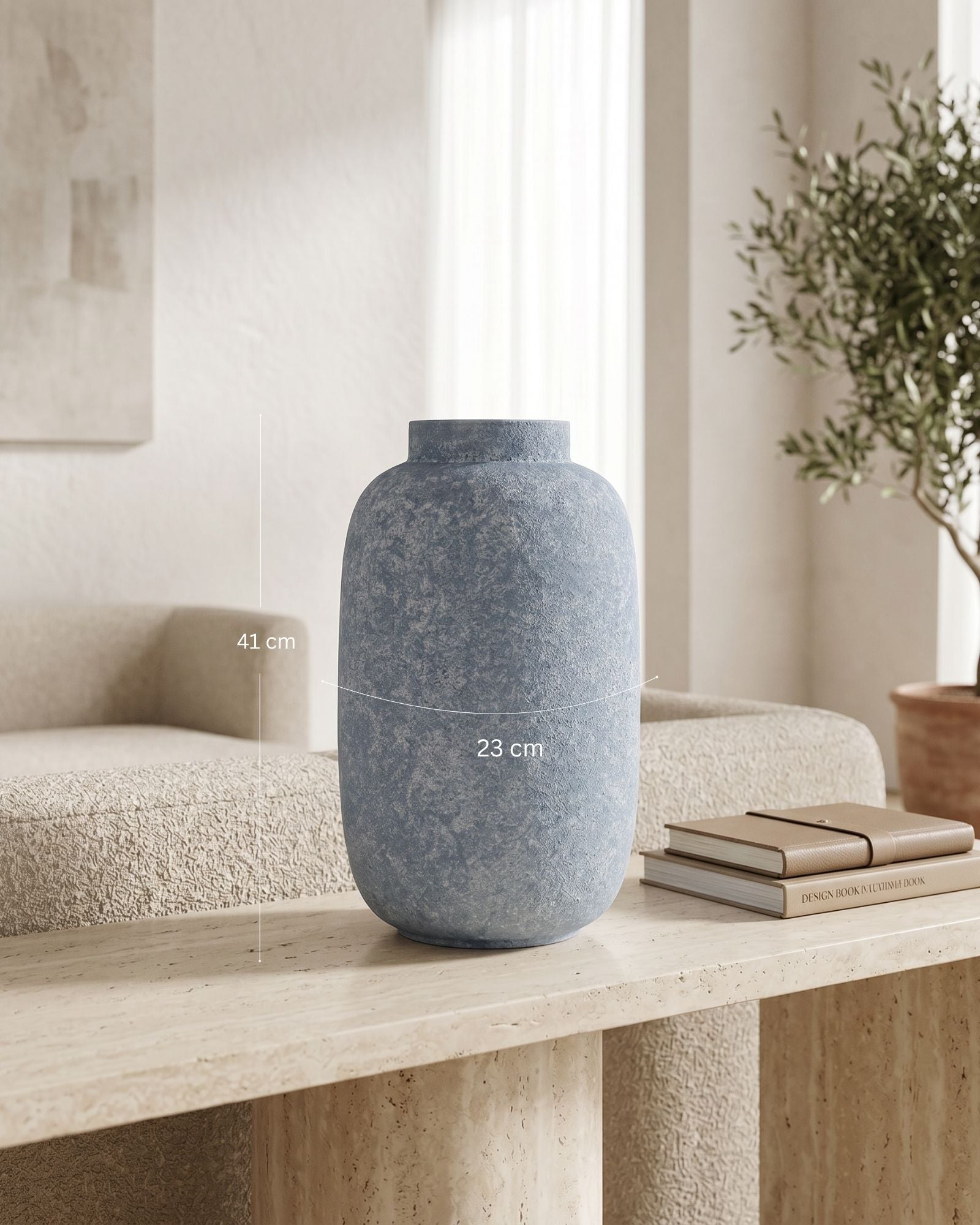 Blue textured vase on a wooden surface with a neutral background