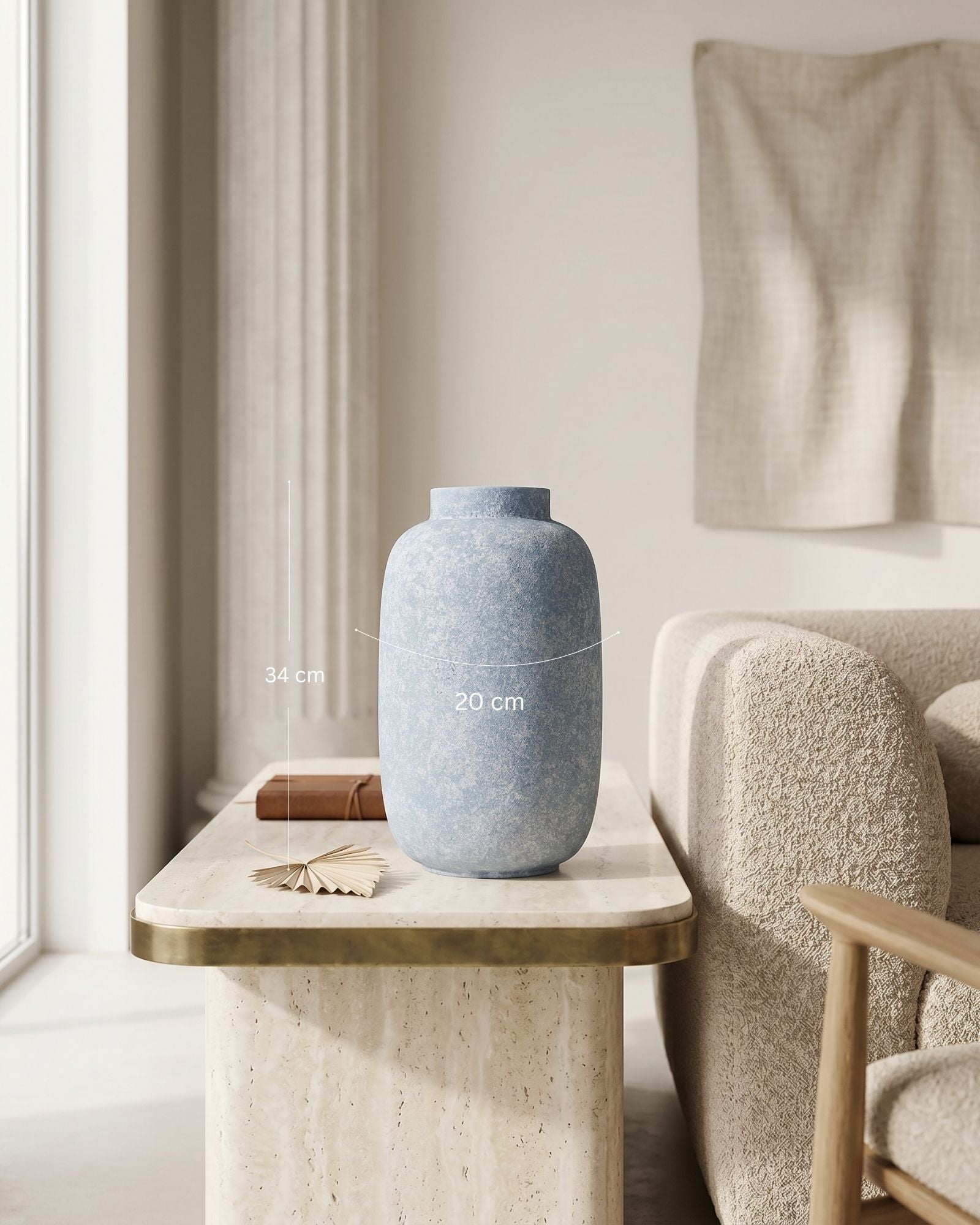 Blue textured vase on a wooden side table with a neutral decor background