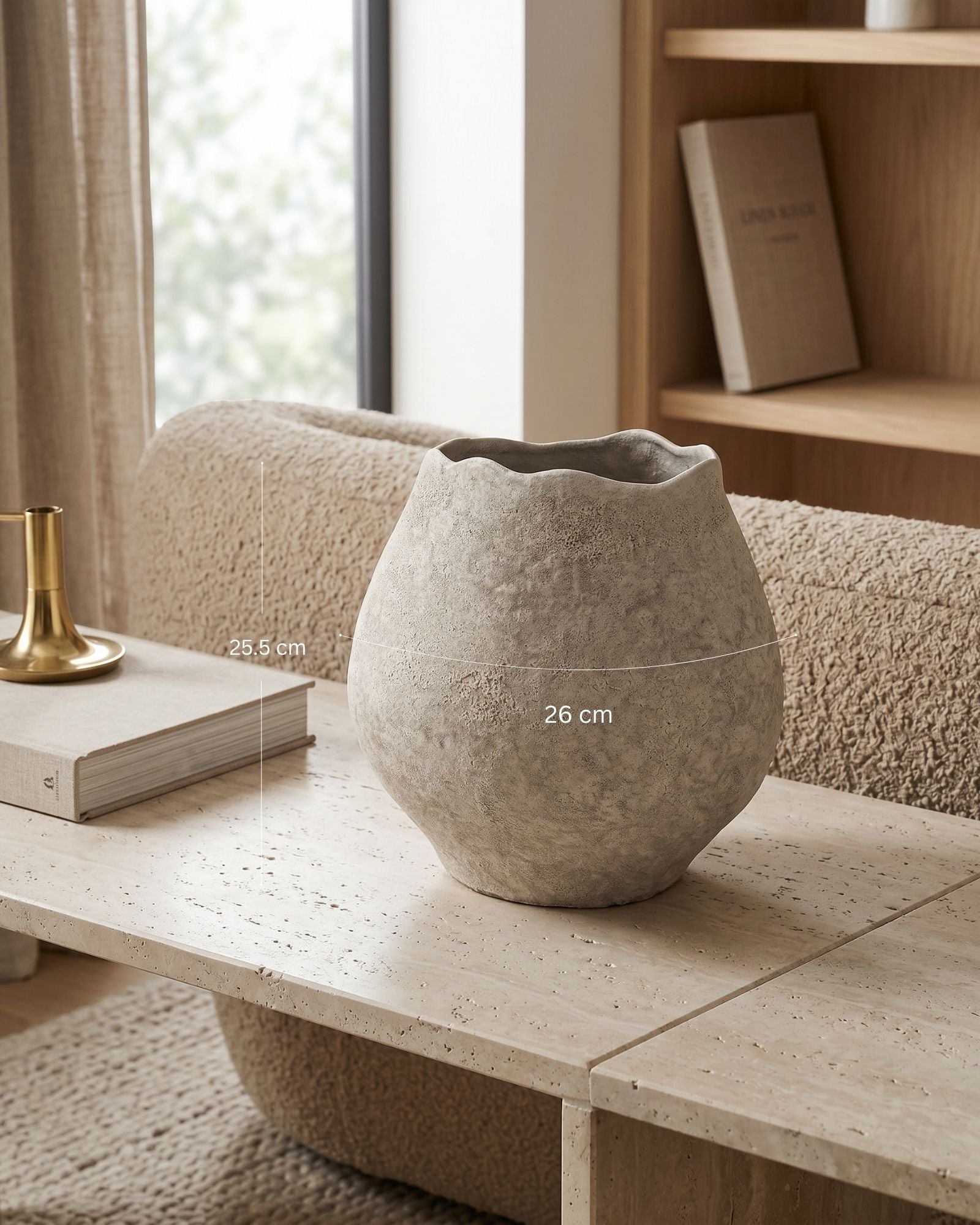 Concrete vase on a coffee table with a blurred background
