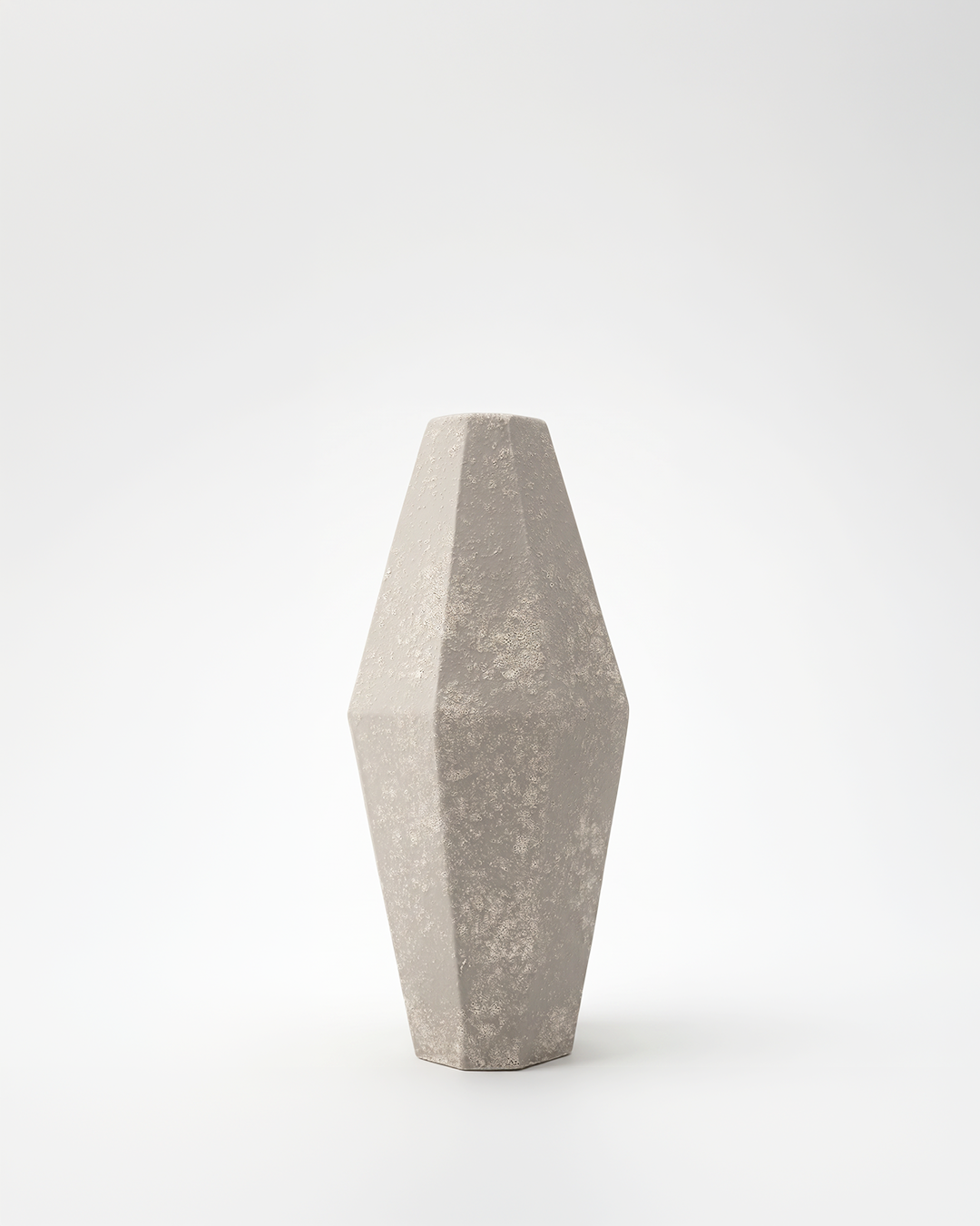 Concrete vase with a geometric design on a white background