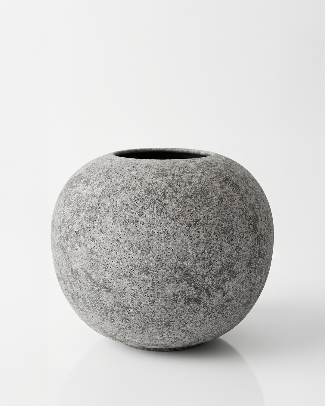 Gray textured vase on a white background