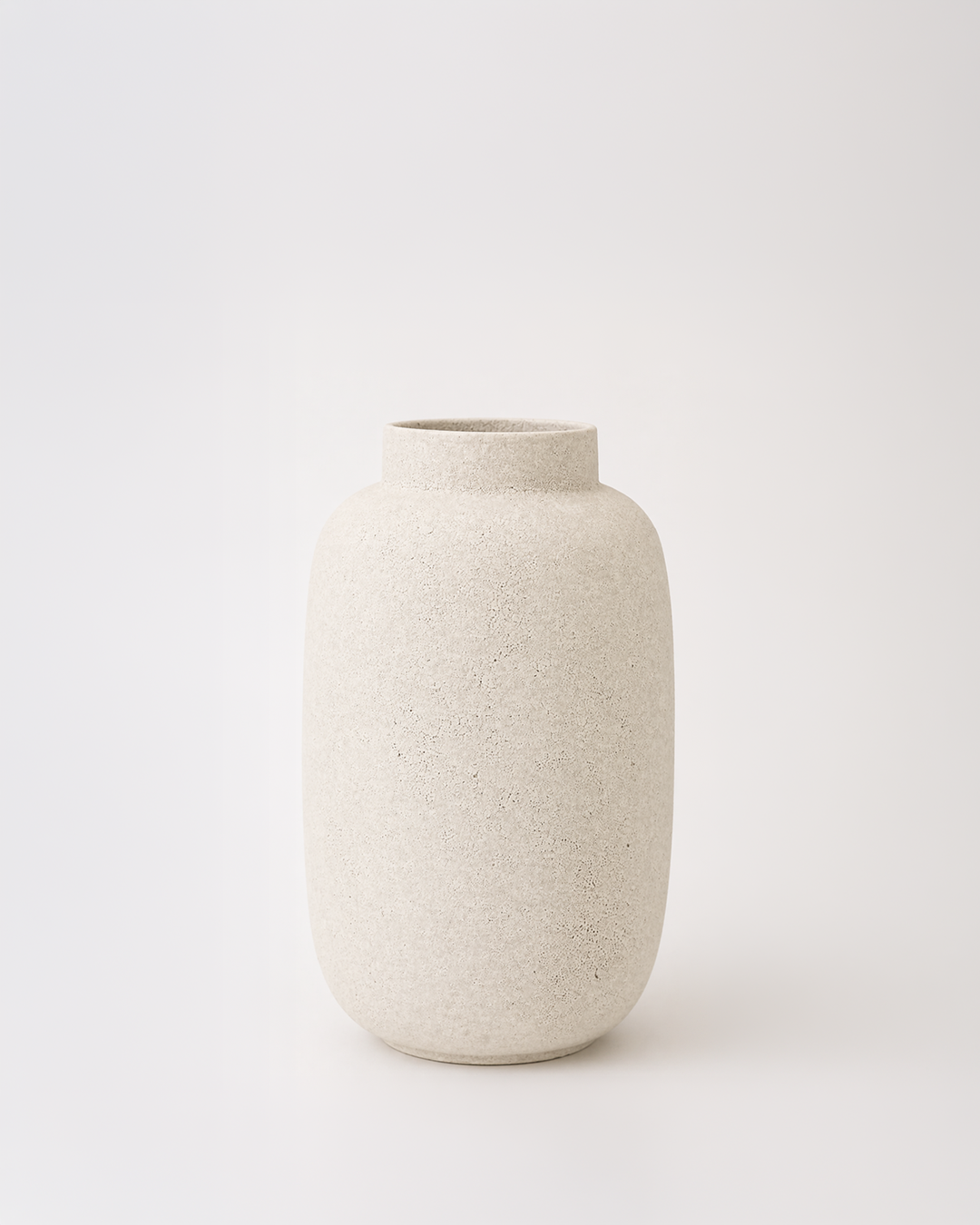 Beige ceramic vase on a white background